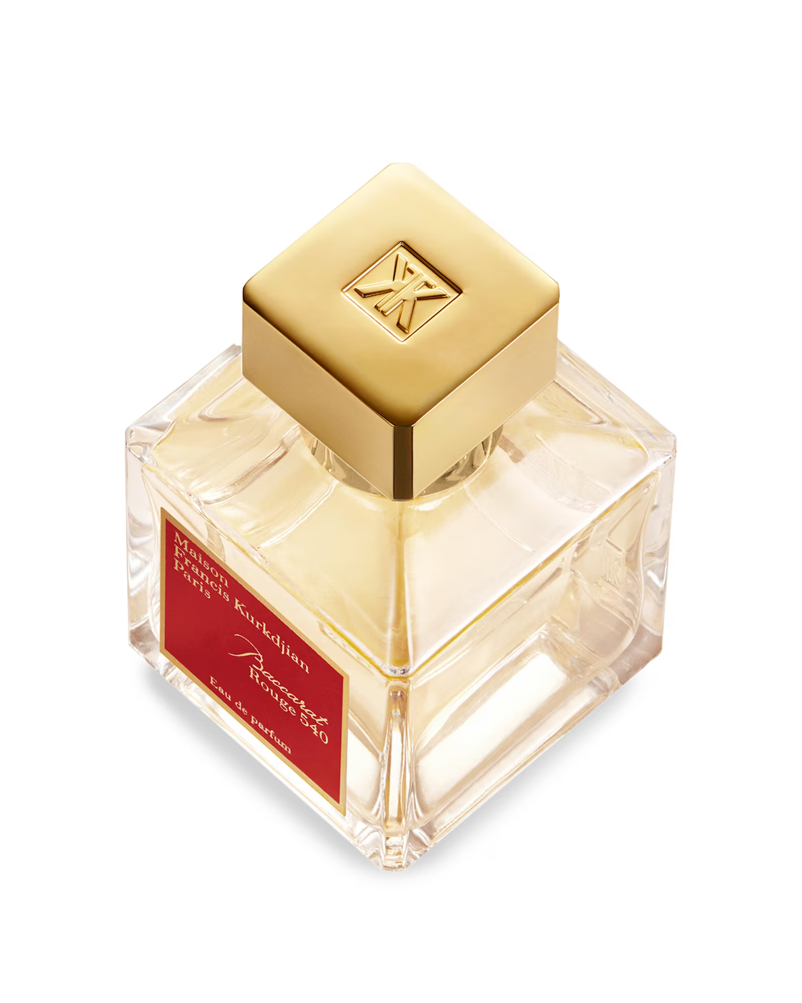 Perfume bottle with gold cap and red label on a white background
