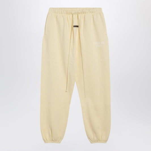 Fear of God Essentials Yellow jogging pants with logo