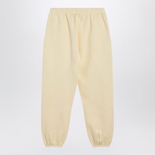 Fear of God Essentials Yellow jogging pants with logo