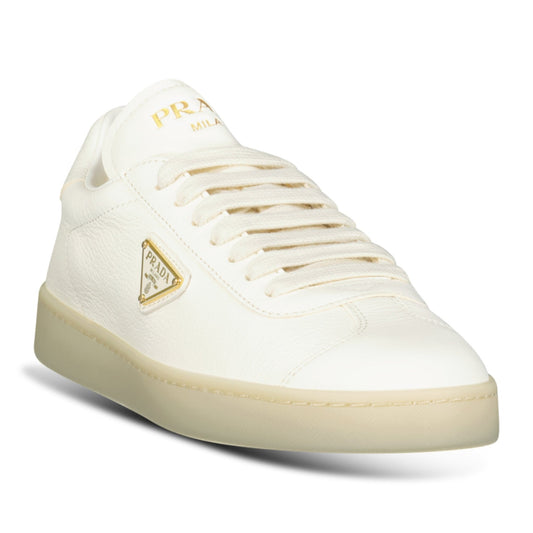 Prada Leather Trainers with Gold Metal Appliqué in Avorio