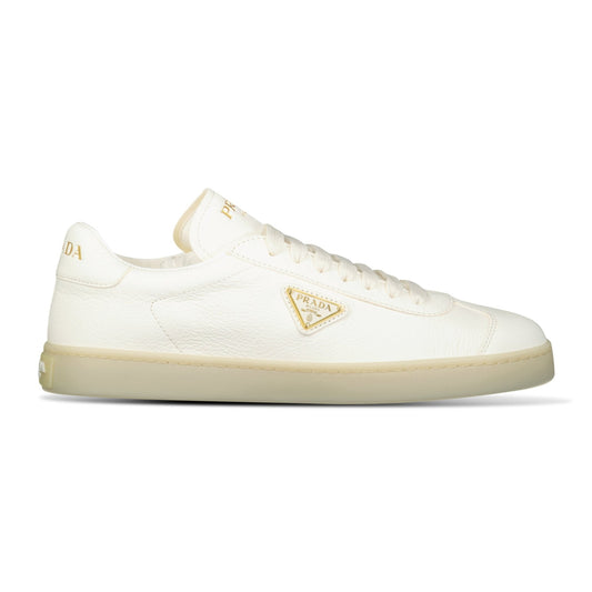 Prada Leather Trainers with Gold Metal Appliqué in Avorio